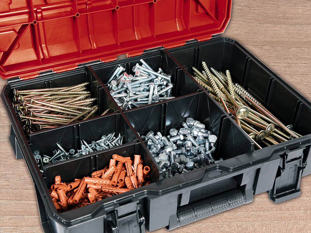 a toolbox with screws sorted